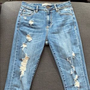 Medium wash skinny jeans.